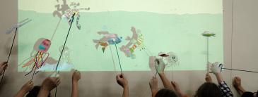 Children with shadow puppets