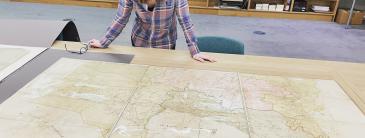 Woman looking at map.