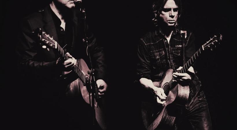 image of two men singing 
