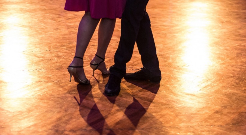 Two people dancing; image of their feet