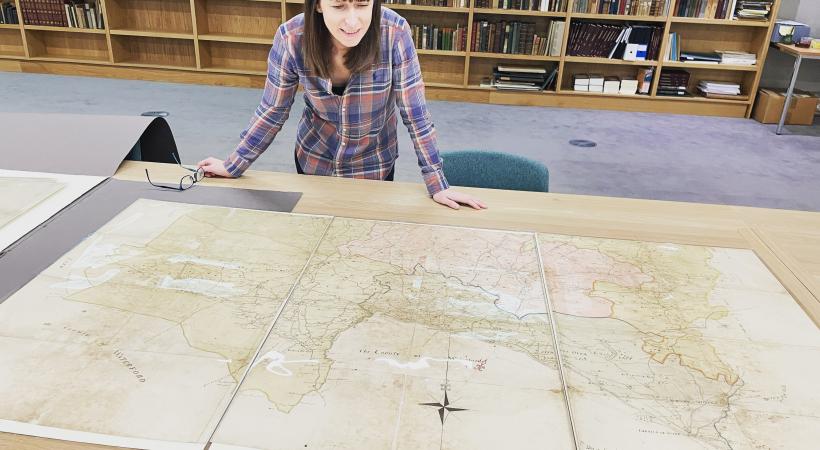Woman looking at map.