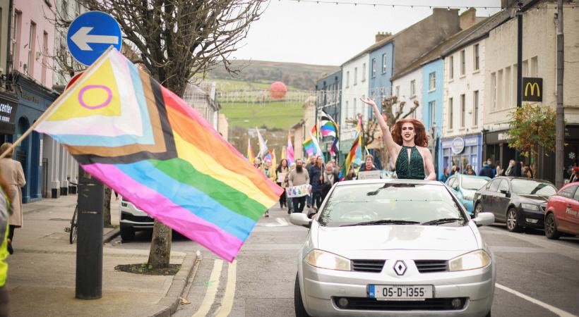 Brightly coloured flag and parade